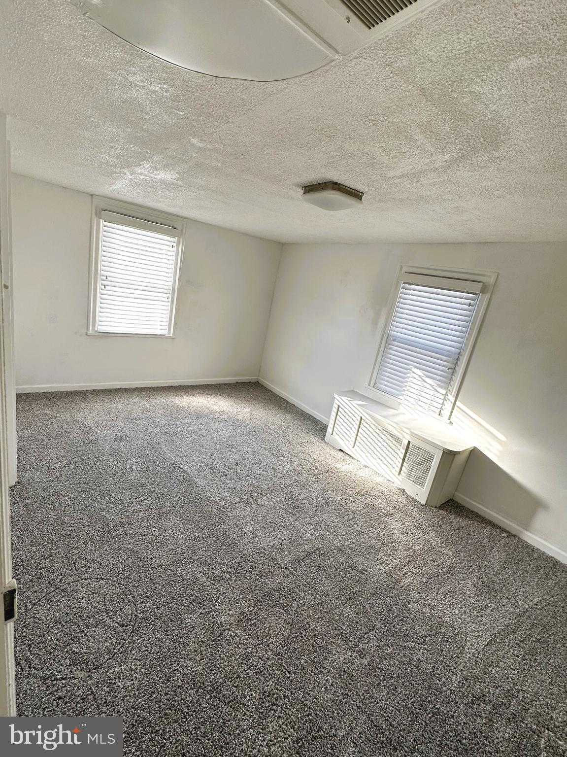 163 Klockner Road Trenton, NJ 08619 - Photo 18 of 22 a view of an empty room with a window