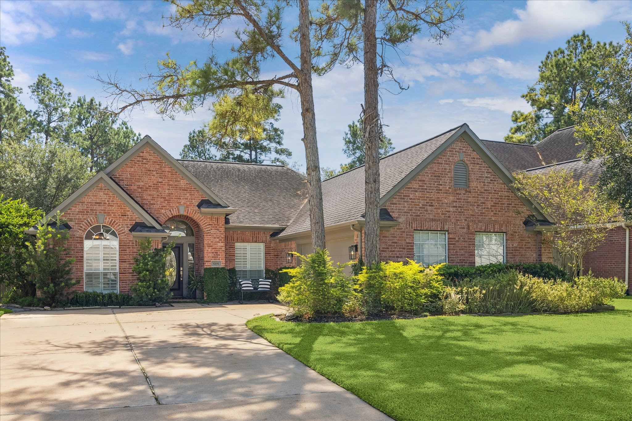 12015 Wynmar Lane Cypress, TX 77429 - Photo 1 of 13 a front view of a house with a garden