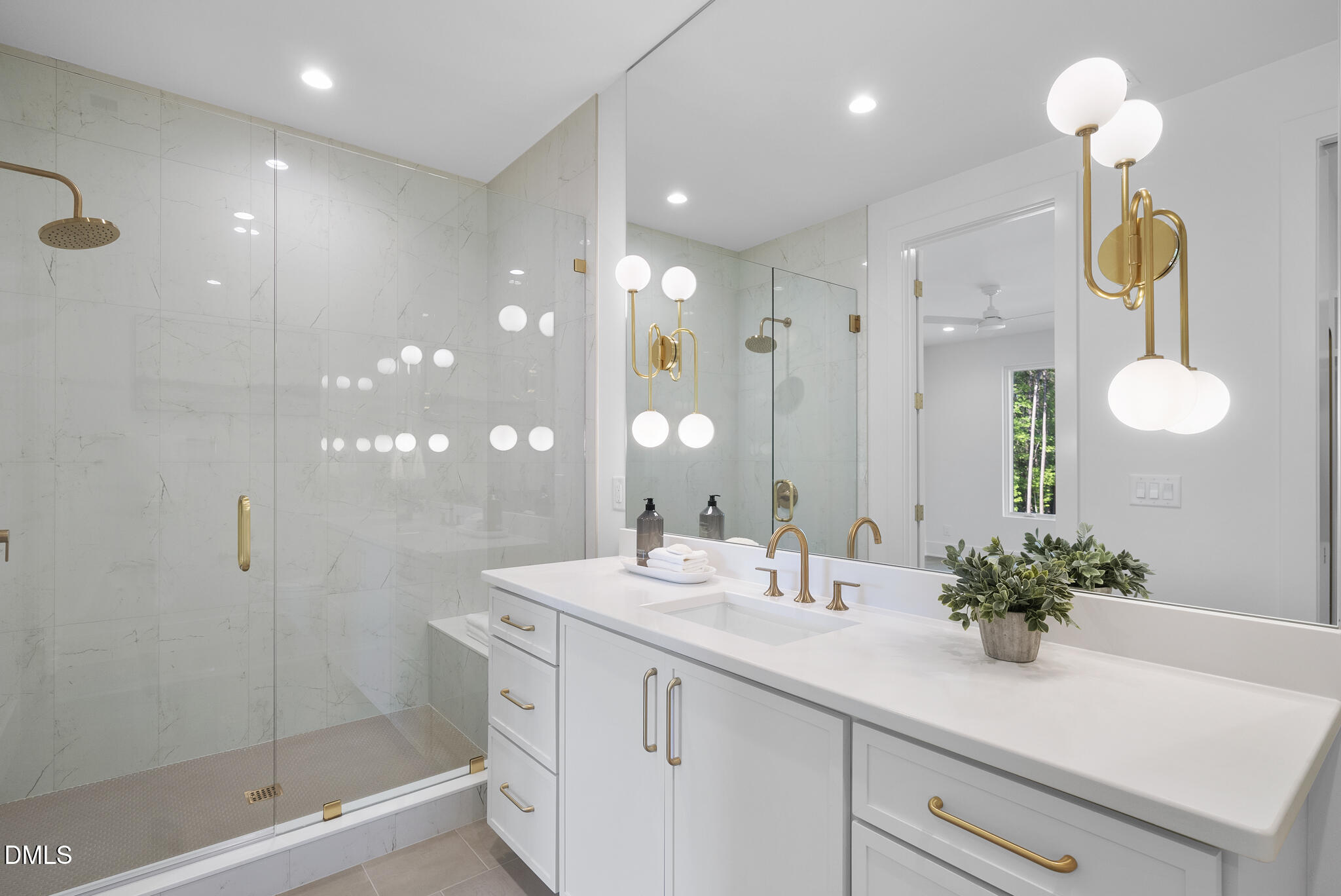 7608 Falls Creek Lane Raleigh, NC 27614 - Photo 49 of 74 a bathroom with a shower sink and mirror