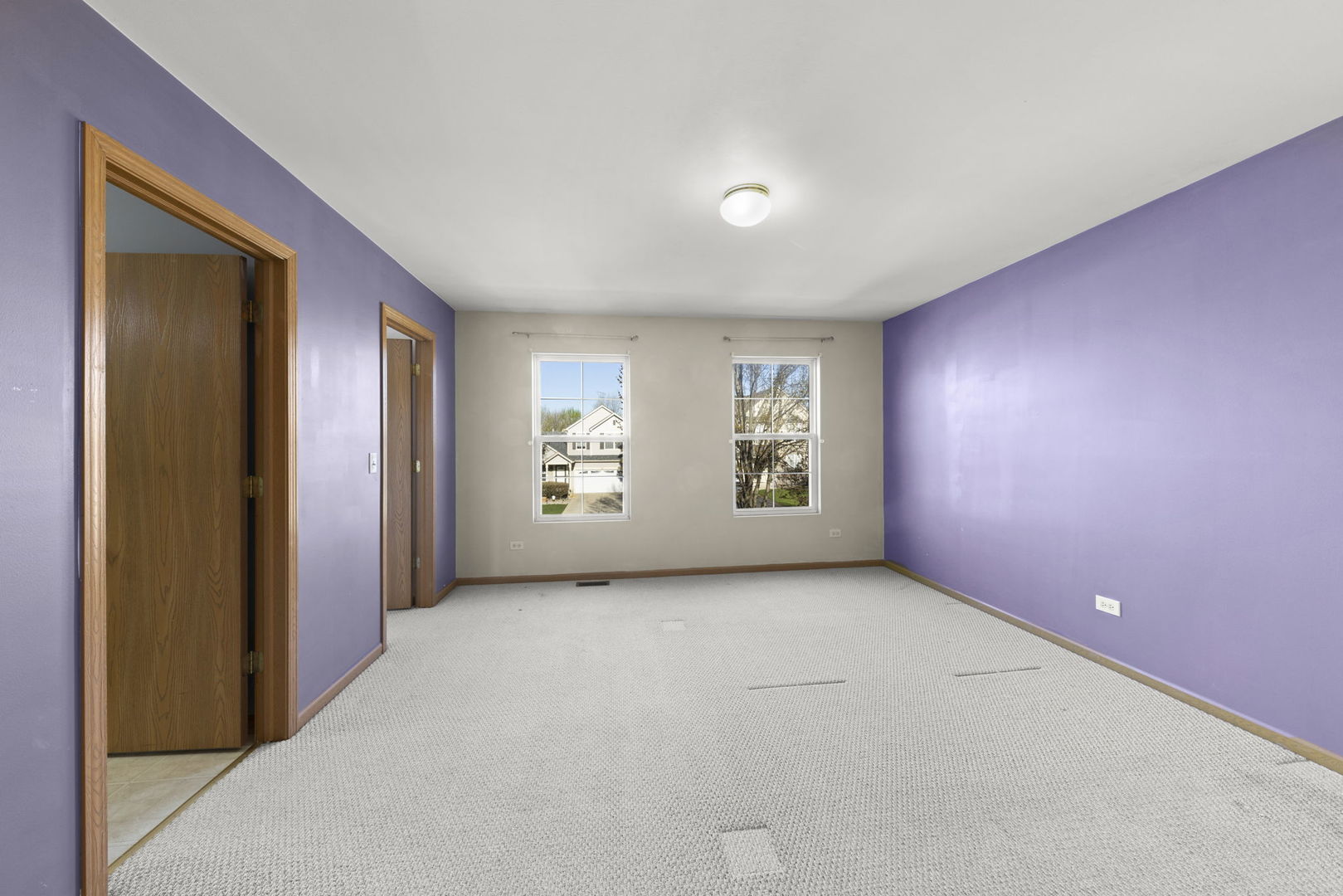 89 Iris Circle Romeoville, IL 60446 - Photo 14 of 28 an empty room with windows