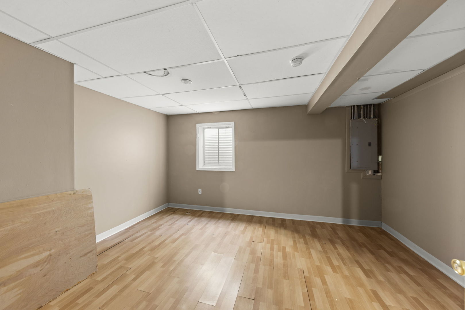 89 Iris Circle Romeoville, IL 60446 - Photo 21 of 28 a view of empty room with wooden floor