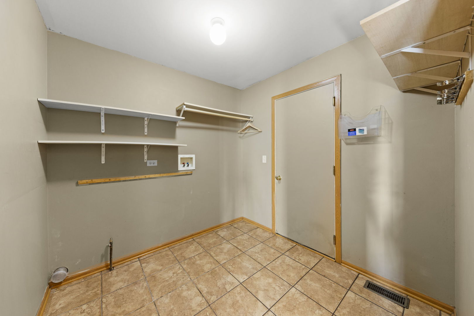 89 Iris Circle Romeoville, IL 60446 - Photo 9 of 28 a view of walk in closet with empty racks