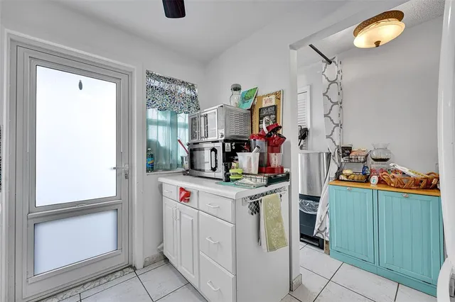 a view of kitchen and utility room
