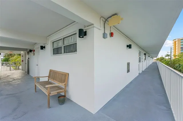 a view of a livingroom with furniture and stairs