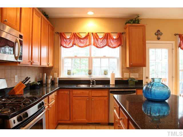 8124 Sommerwell Street Raleigh, NC 27613 - Photo 5 of 23 Kitchen