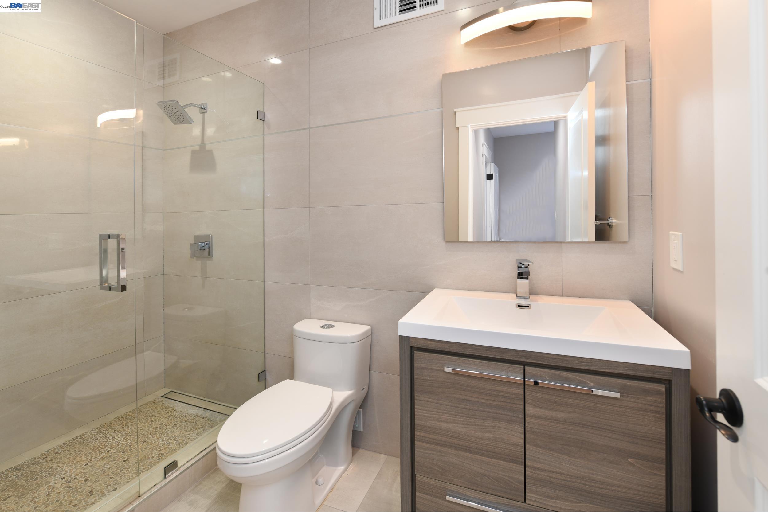1516 Pleasant Hill Road Lafayette, CA 94549 - Photo 26 of 38 a bathroom with a sink toilet and shower