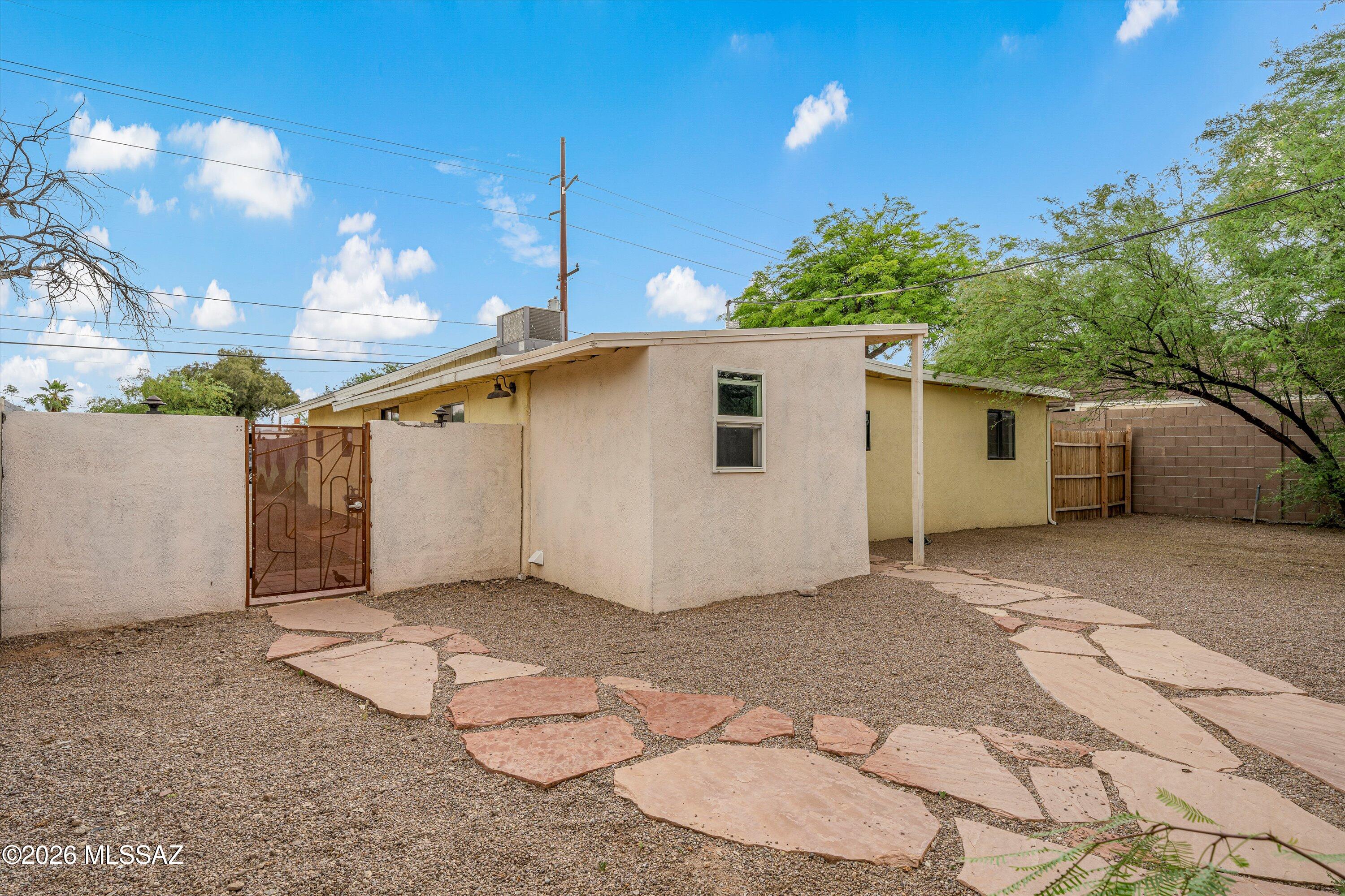 2841 North Richey Boulevard Tucson, AZ 85716 - Photo 25 of 30 a view of a house with a backyard