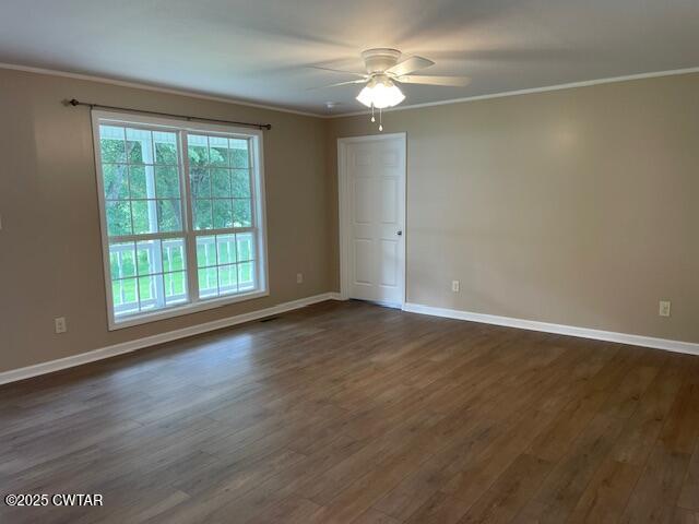 874 Key Road Troy, TN 38260 - Photo 15 of 48 an empty room with wooden floor and windows