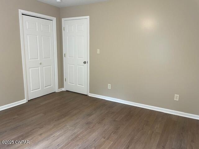 874 Key Road Troy, TN 38260 - Photo 30 of 48 a view of an empty room with wooden floor