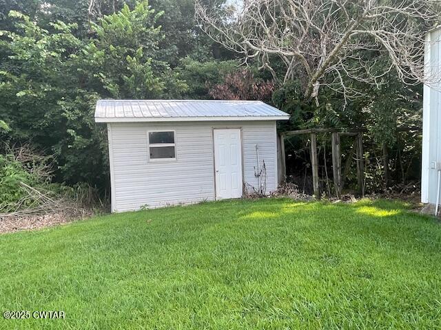 874 Key Road Troy, TN 38260 - Photo 39 of 48 a view of a backyard with barn and large trees