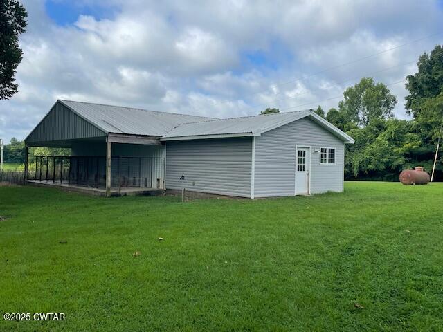 874 Key Road Troy, TN 38260 - Photo 41 of 48 a view of a house with a backyard