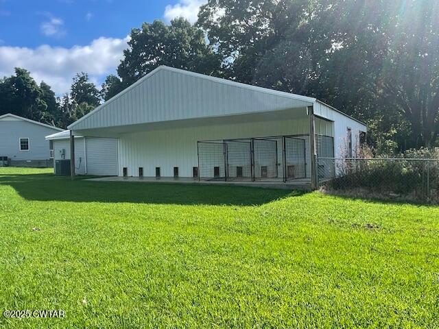 874 Key Road Troy, TN 38260 - Photo 43 of 48 a view of a house with a yard
