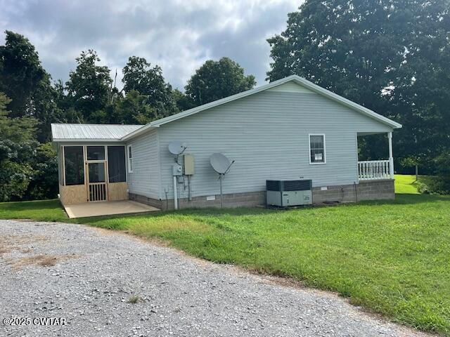 874 Key Road Troy, TN 38260 - Photo 6 of 48 a front view of house with yard and green space