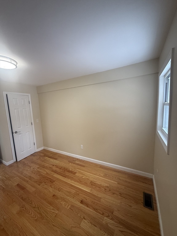 7 Williston Road, Unit A Belmont, MA 02478 - Photo 3 of 10 a view of an empty room