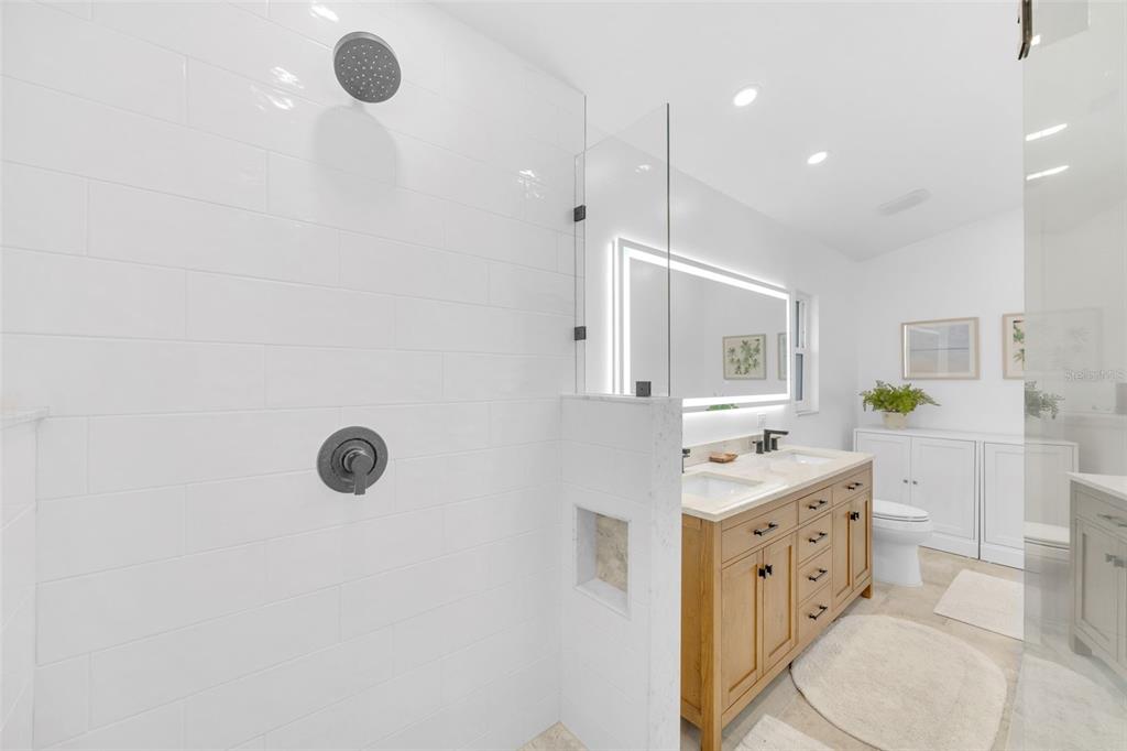 3535 Moores Lake Road Dover, FL 33527 - Photo 41 of 85 Completely Remodeled Primary Ensuite! Everything is NEW, and the fancy mirror is lighted and heated!