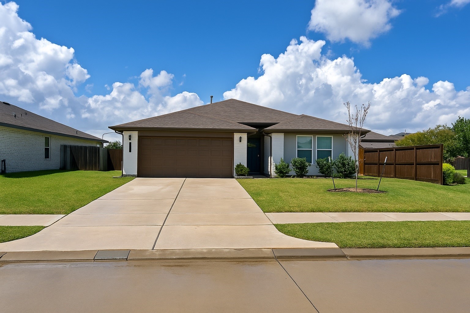 16 Desert Spring Lane Manvel, TX 77578 - Photo 1 of 11 A neatly edged front lawn and smooth spacious driveway.