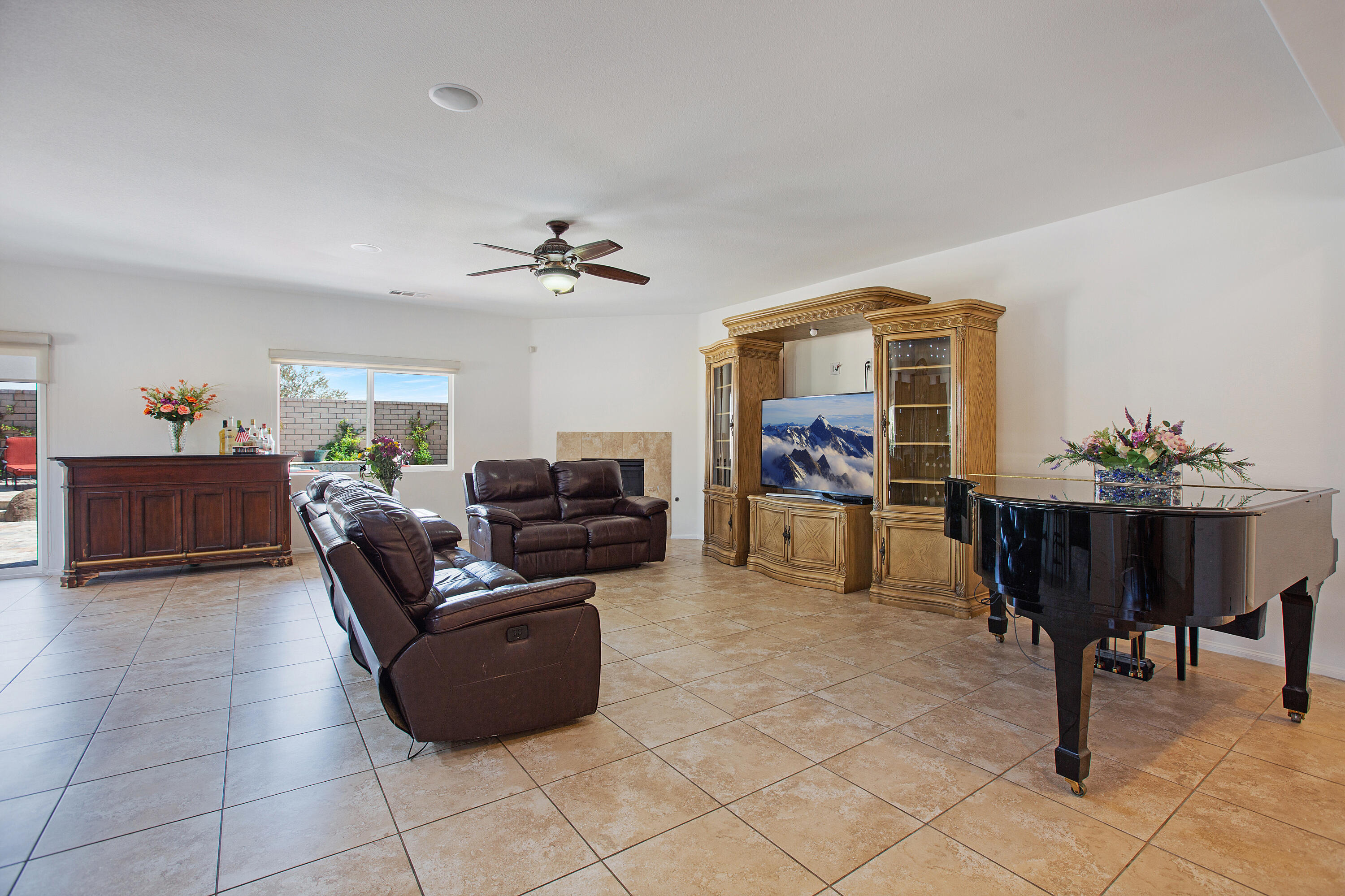 35922 Raphael Drive Palm Desert, CA 92211 - Photo 15 of 33 a living room with furniture and a dining table with kitchen view