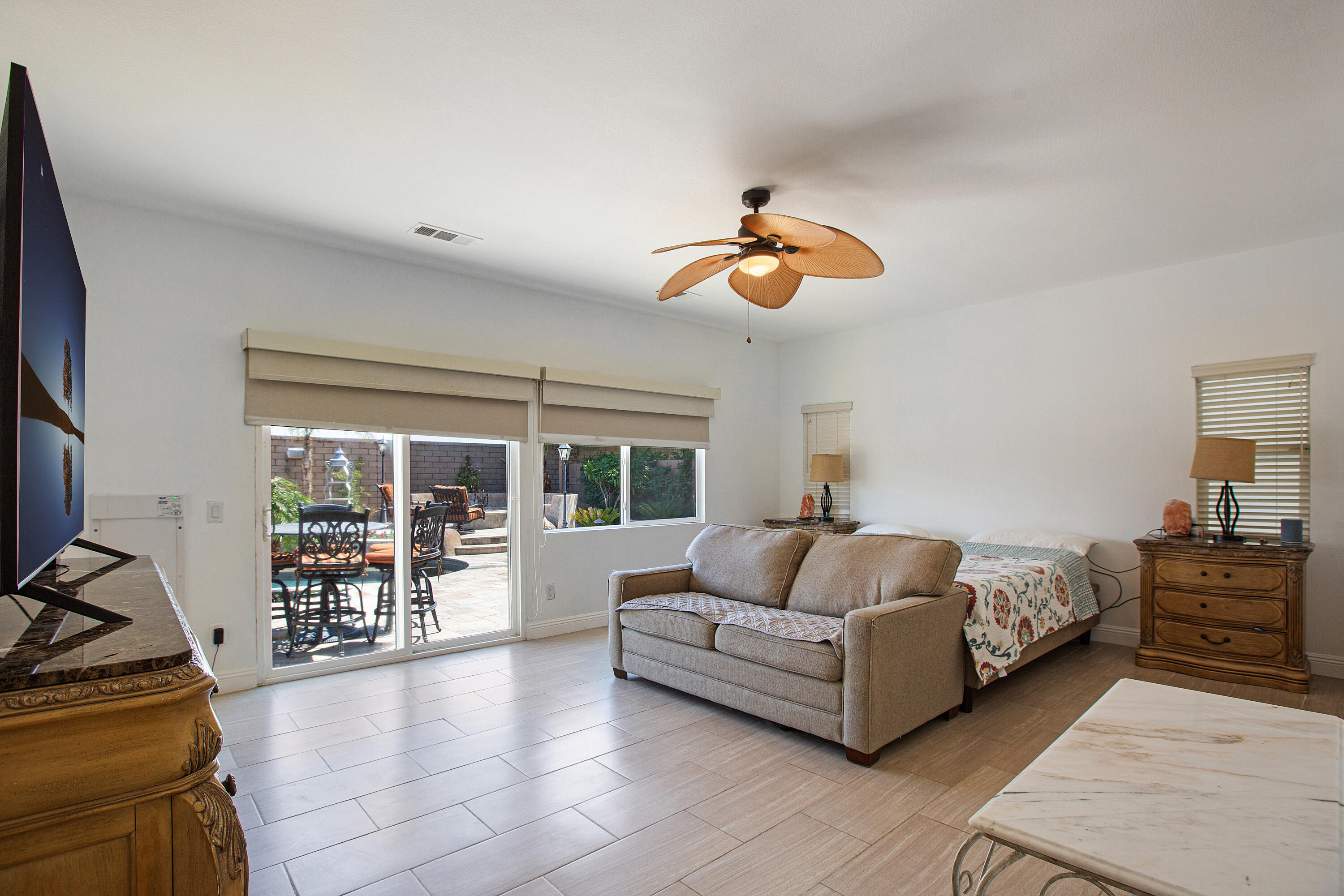 35922 Raphael Drive Palm Desert, CA 92211 - Photo 18 of 33 a living room with furniture and a flat screen tv