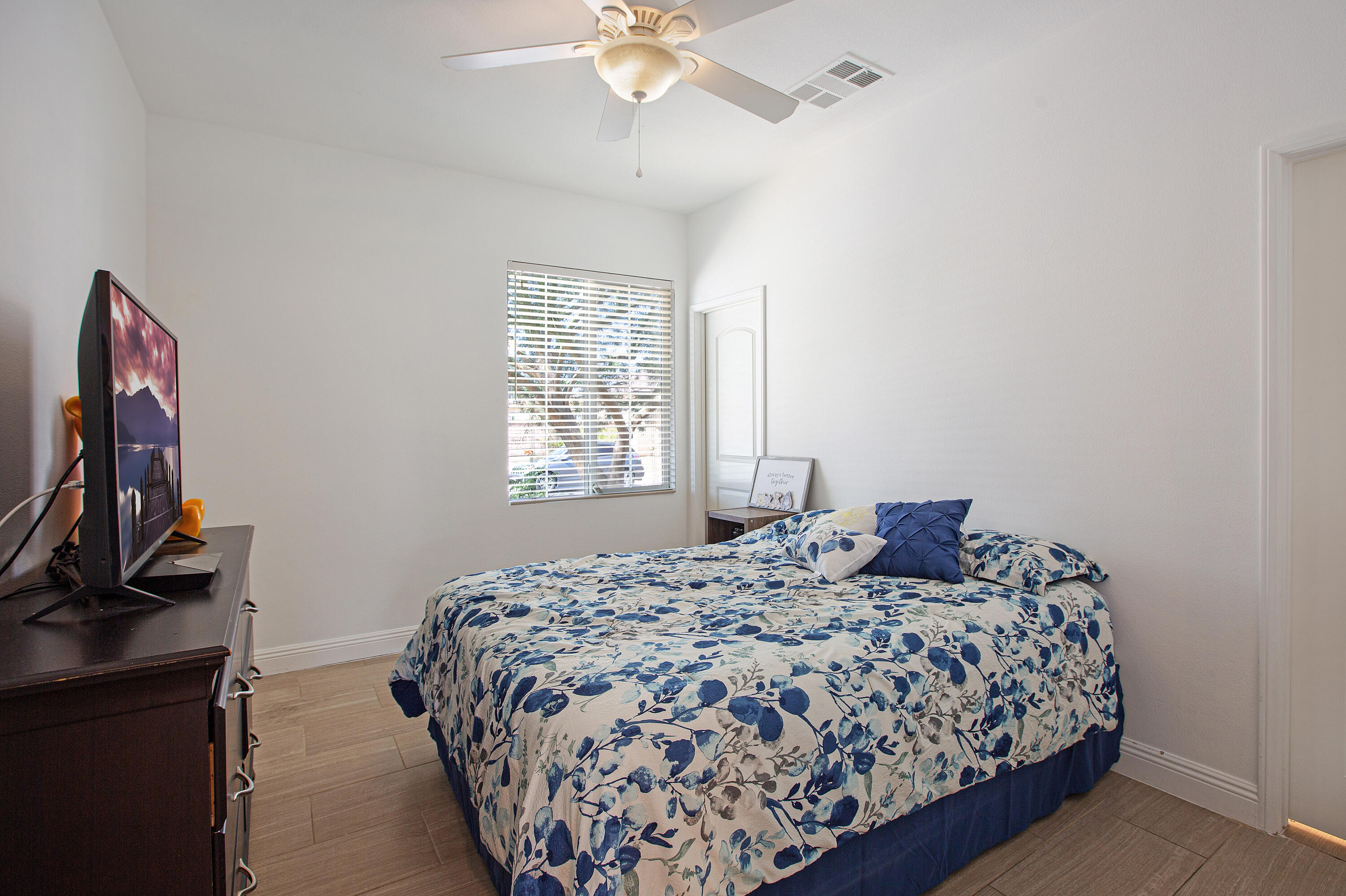 35922 Raphael Drive Palm Desert, CA 92211 - Photo 22 of 33 a bedroom with a bed and a window