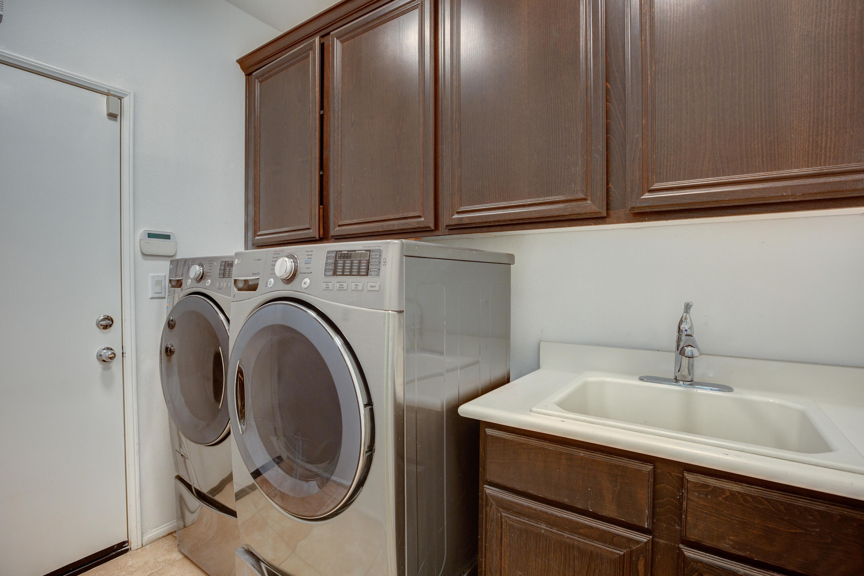 35922 Raphael Drive Palm Desert, CA 92211 - Photo 24 of 33 a utility room with dryer and washer