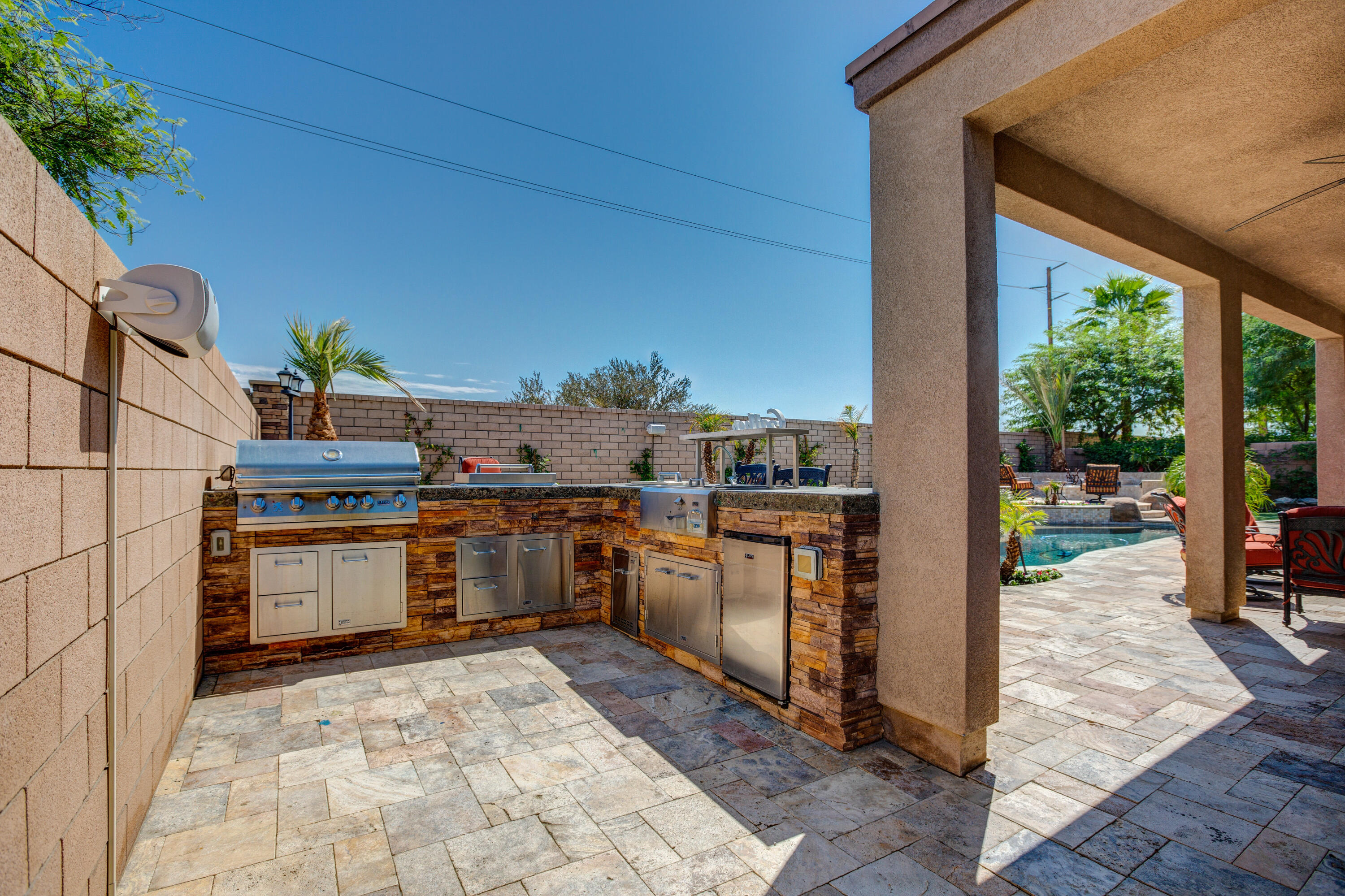 35922 Raphael Drive Palm Desert, CA 92211 - Photo 7 of 33 a kitchen with a stove a sink and a refrigerator
