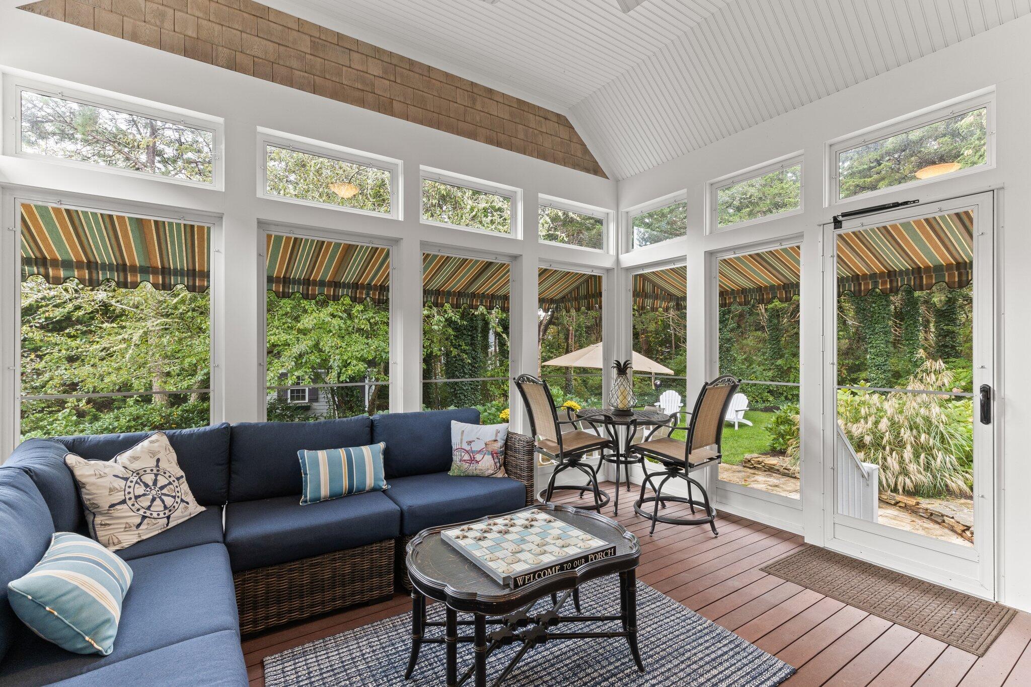 9 Briar Spring Road Orleans, MA 02653 - Photo 21 of 65 a living room with furniture and a large window