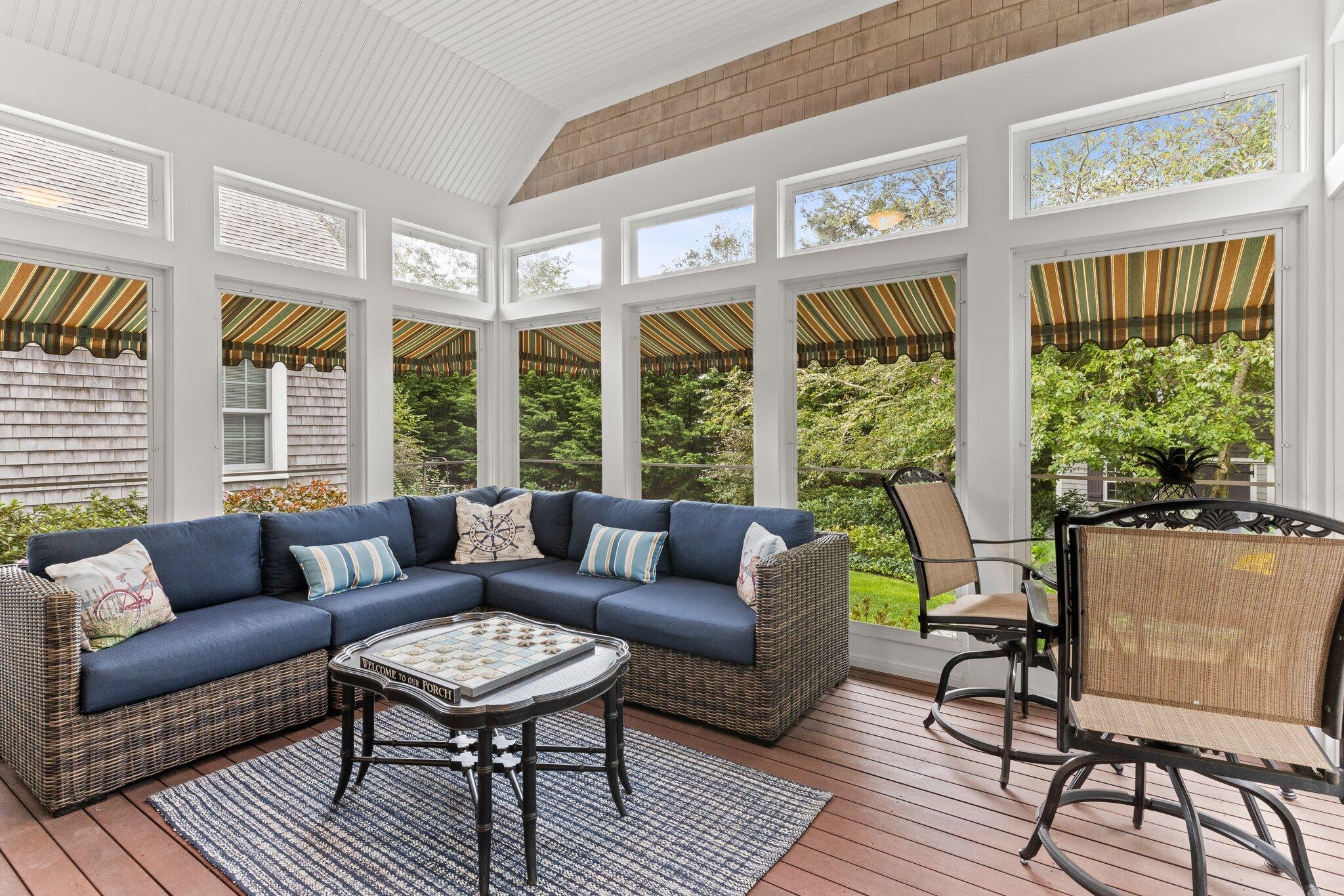 9 Briar Spring Road Orleans, MA 02653 - Photo 22 of 65 a living room with furniture and a large window