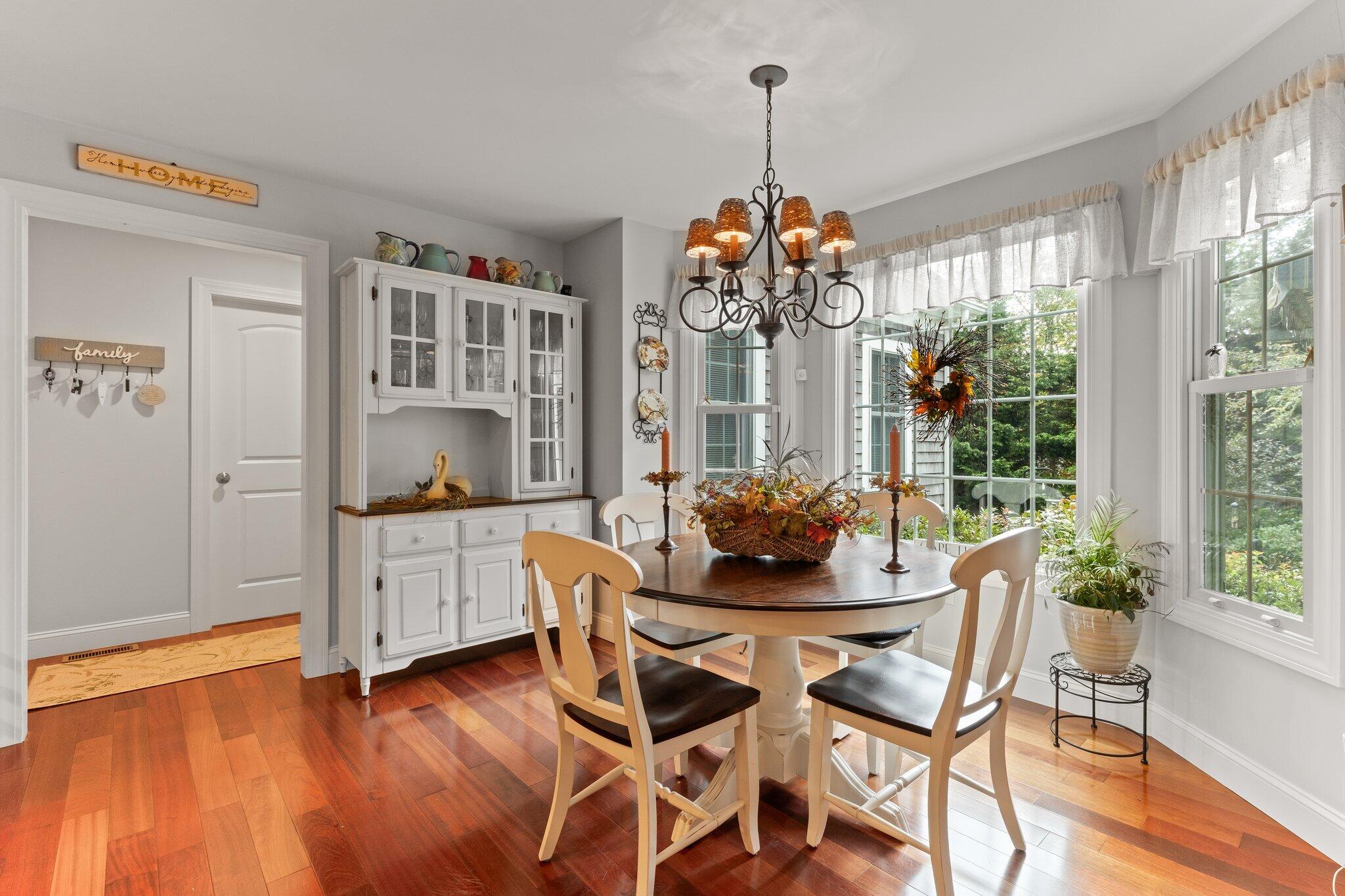 9 Briar Spring Road Orleans, MA 02653 - Photo 26 of 65 a view of a dining room with furniture window and wooden floor