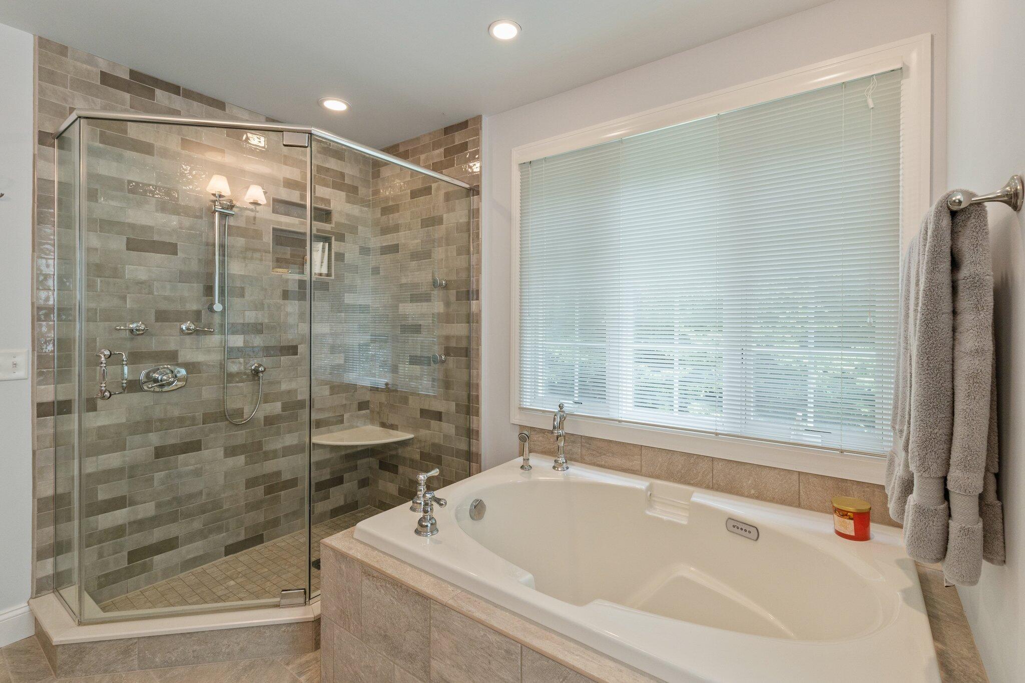 9 Briar Spring Road Orleans, MA 02653 - Photo 31 of 65 a bathroom with a bathtub and a shower