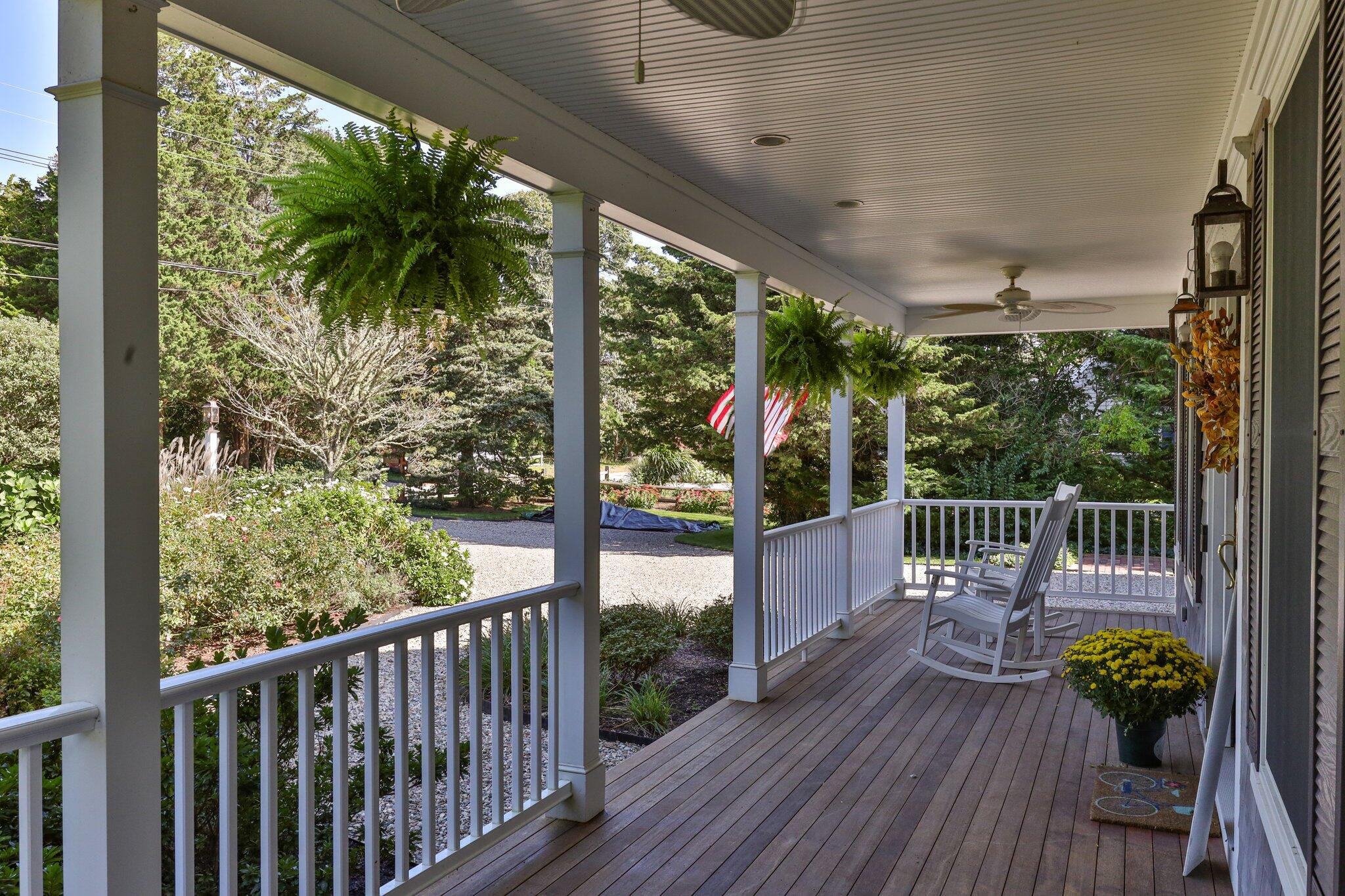 9 Briar Spring Road Orleans, MA 02653 - Photo 4 of 65 a view of a balcony with wooden floor