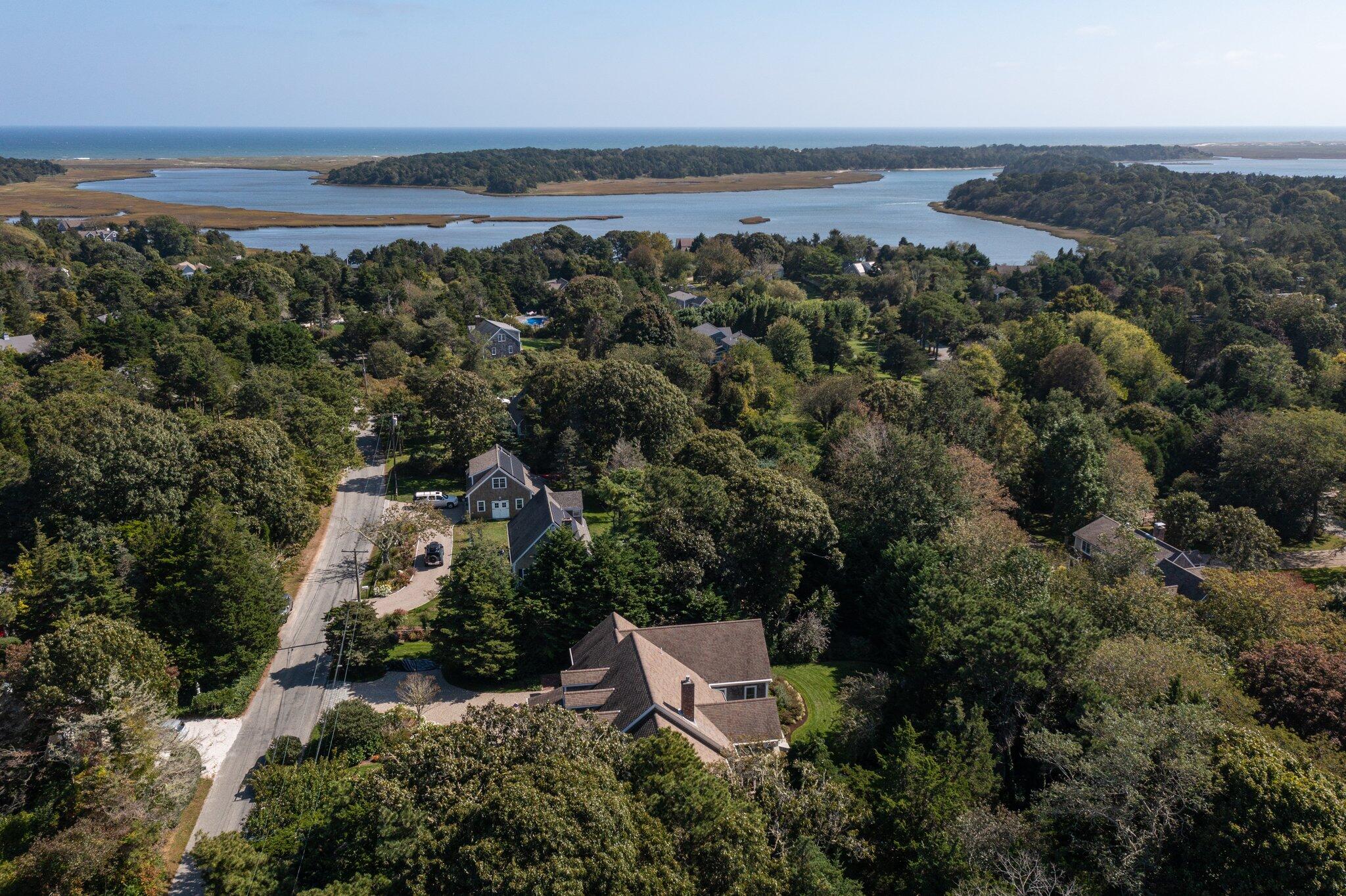 9 Briar Spring Road Orleans, MA 02653 - Photo 60 of 65 an aerial view of a house with a yard