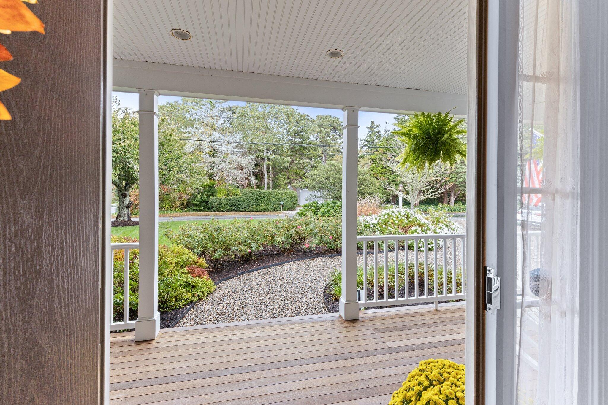 9 Briar Spring Road Orleans, MA 02653 - Photo 7 of 65 a view of a room with wooden floor and outdoor space