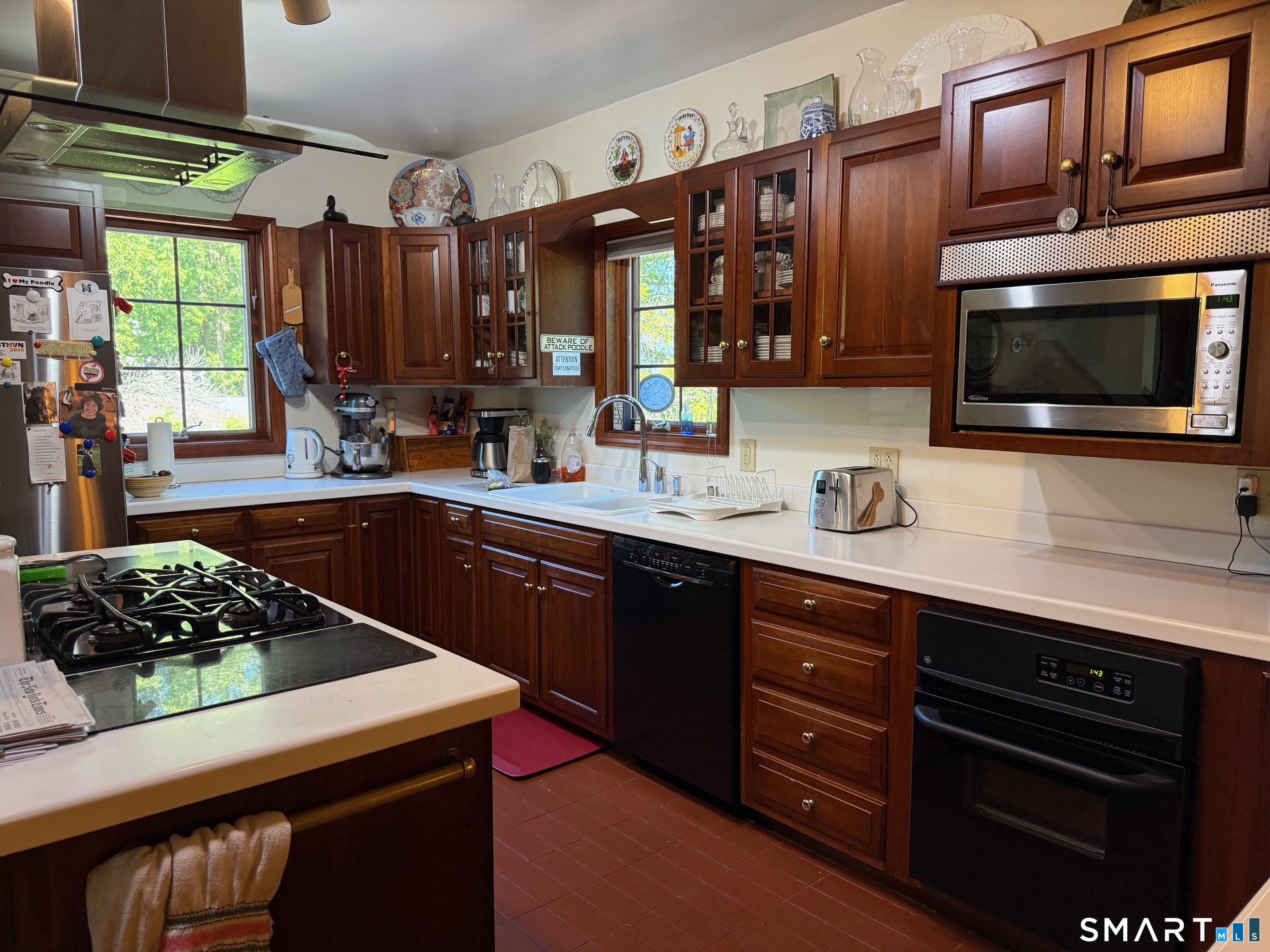 8 Ivy Road Stonington, CT 06355 - Photo 14 of 30 a kitchen with a sink stove and microwave