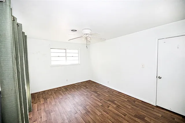 a picture of a bathroom with a shower