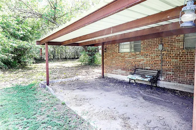 a view of a kitchen with appliances