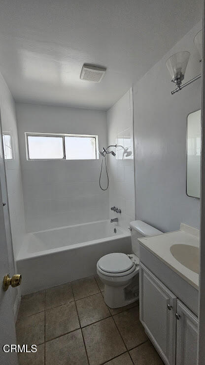 1710 Vine Street, Unit H Alhambra, CA 91801 - Photo 12 of 13 a bathroom with a granite countertop toilet a sink and bathtub