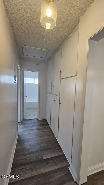 1710 Vine Street, Unit H Alhambra, CA 91801 - Photo 13 of 13 a view of a hallway with wooden floor