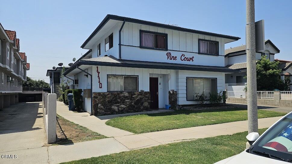 1710 Vine Street, Unit H Alhambra, CA 91801 - Photo 4 of 13 a front view of a house with a yard