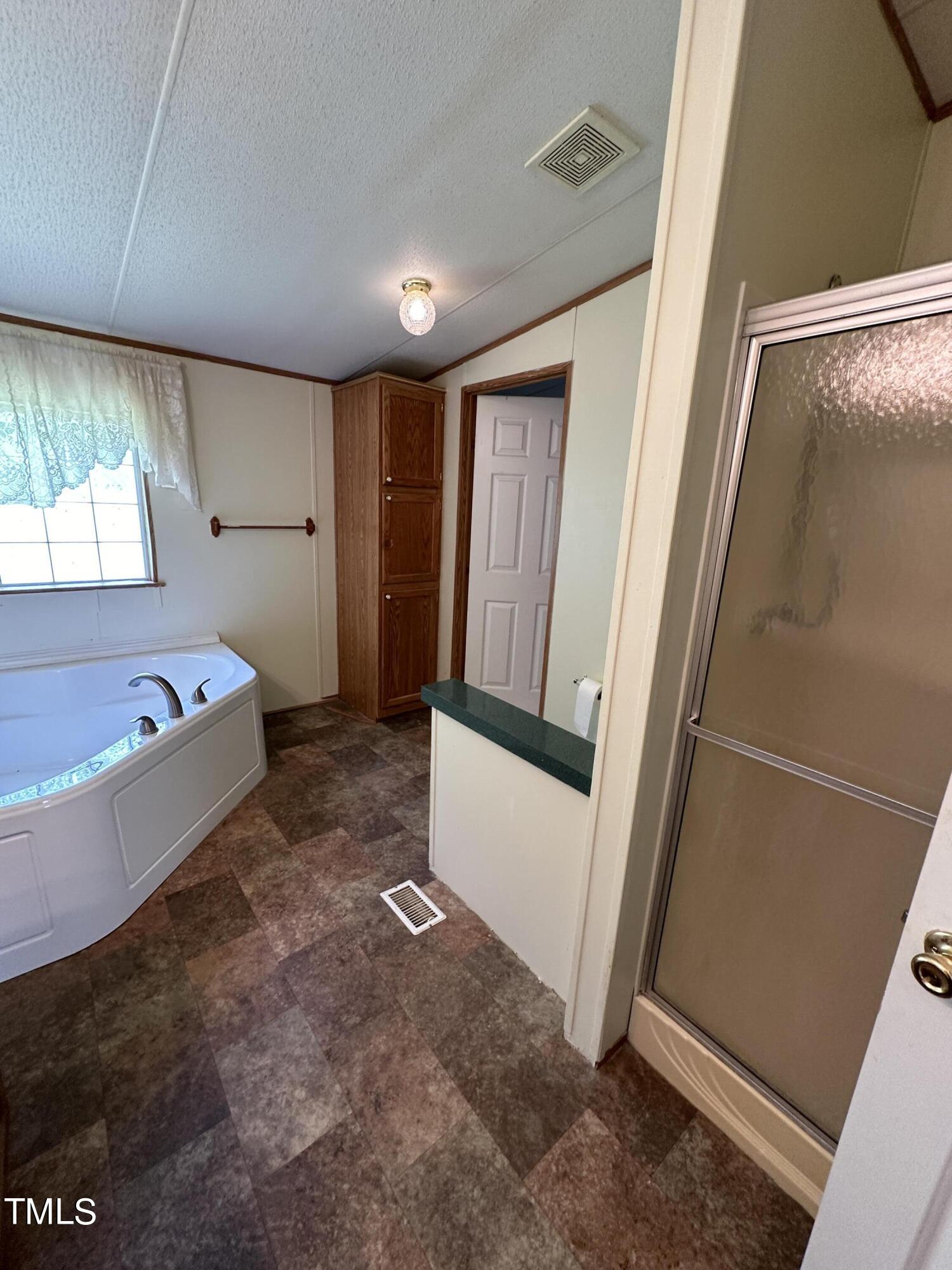291 Pixley Pritchard Road Timberlake, NC 27583 - Photo 23 of 38 a view of a room with window