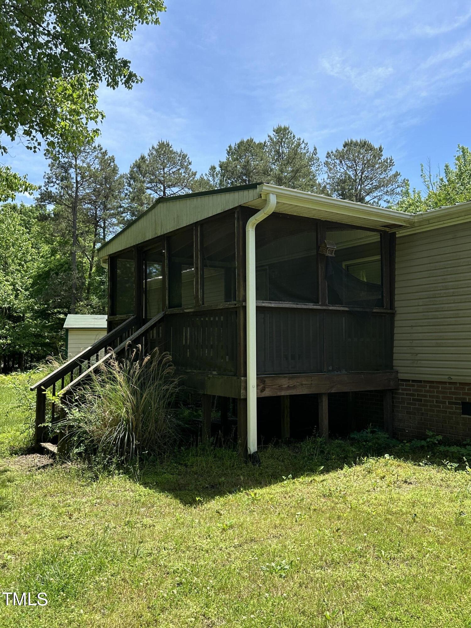 291 Pixley Pritchard Road Timberlake, NC 27583 - Photo 28 of 38 a view of a backyard
