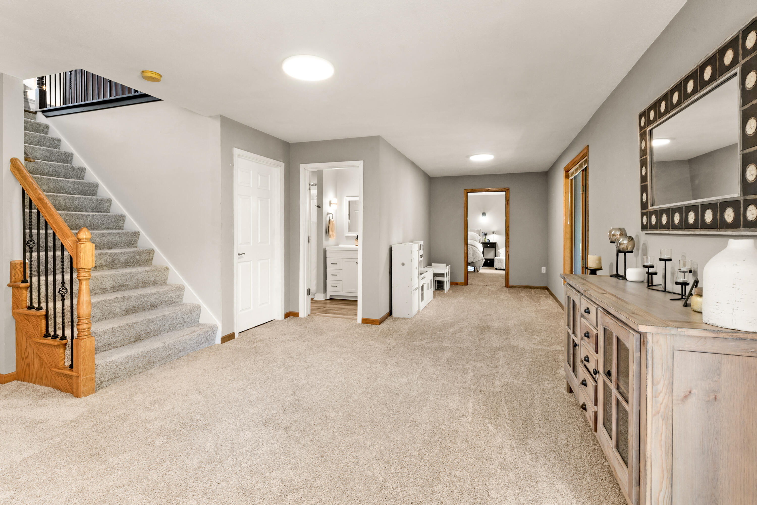 618 2 Rivers Drive Mukwonago, WI 53149 - Photo 30 of 59 Grand Staircase to Lower Level