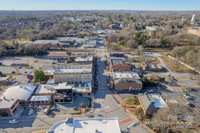 an aerial view of a city with lots of residential buildings