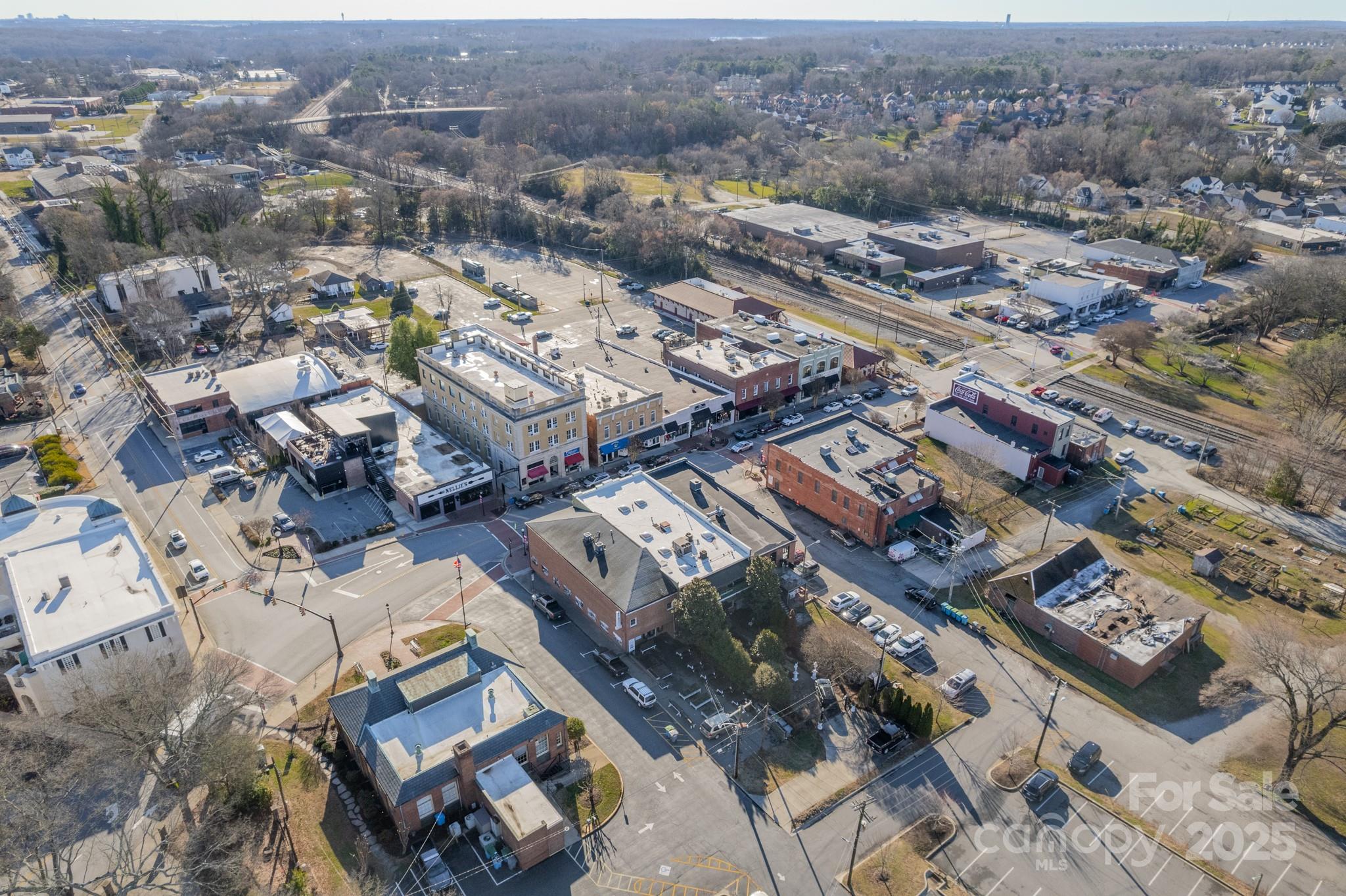 525 Winding Way Belmont, NC 28012 - Photo 29 of 41 an aerial view of a city with lots of residential buildings