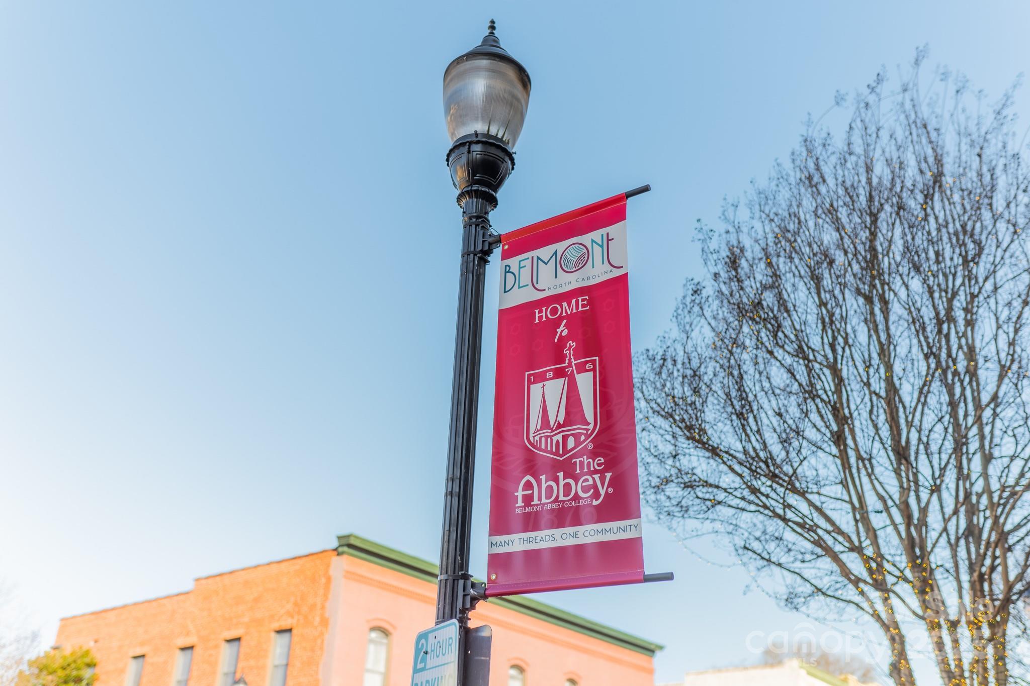 525 Winding Way Belmont, NC 28012 - Photo 37 of 41 a sign that is on a brick wall