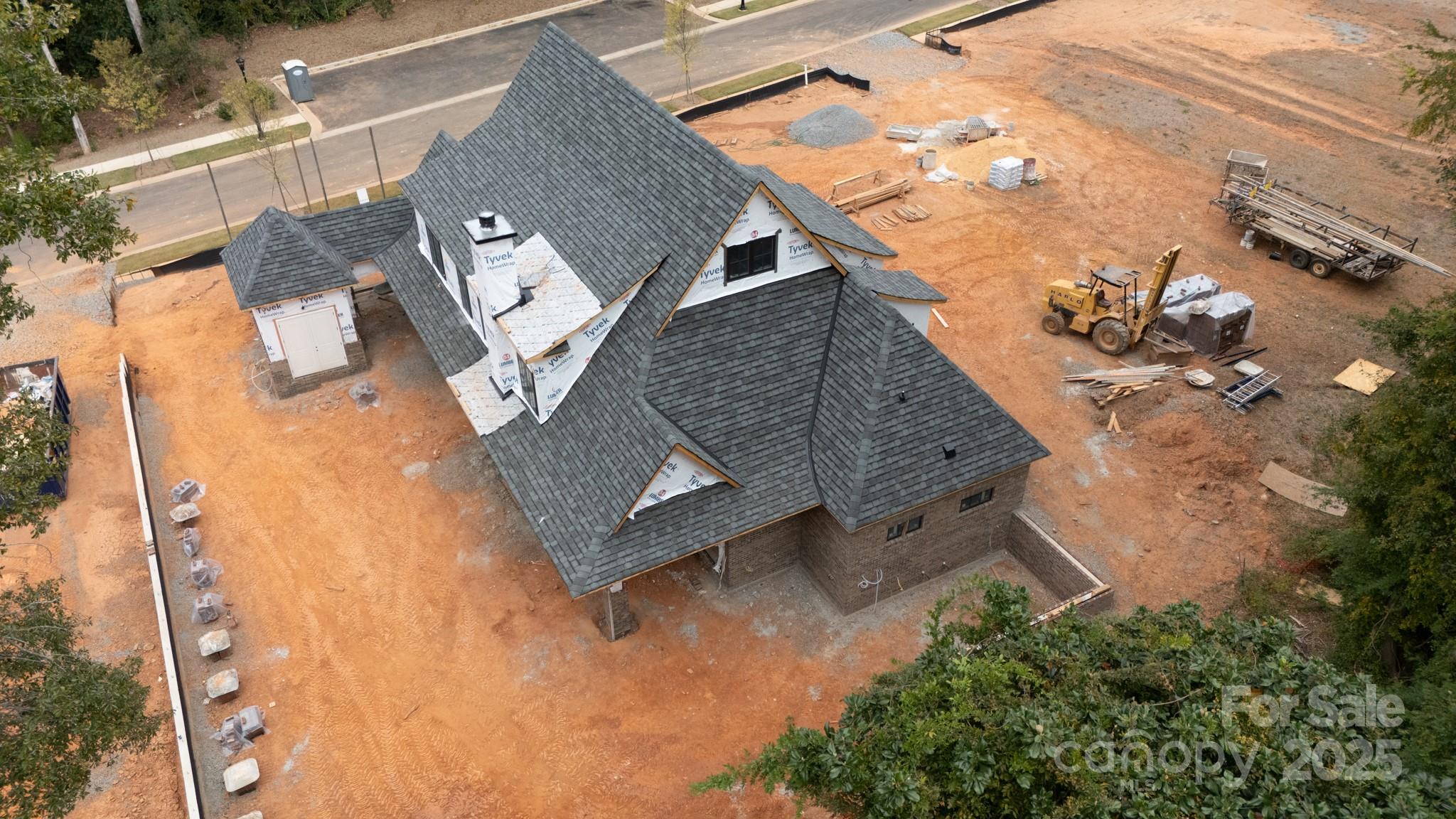 525 Winding Way Belmont, NC 28012 - Photo 9 of 41 an aerial view of a house with a yard and wooden fence