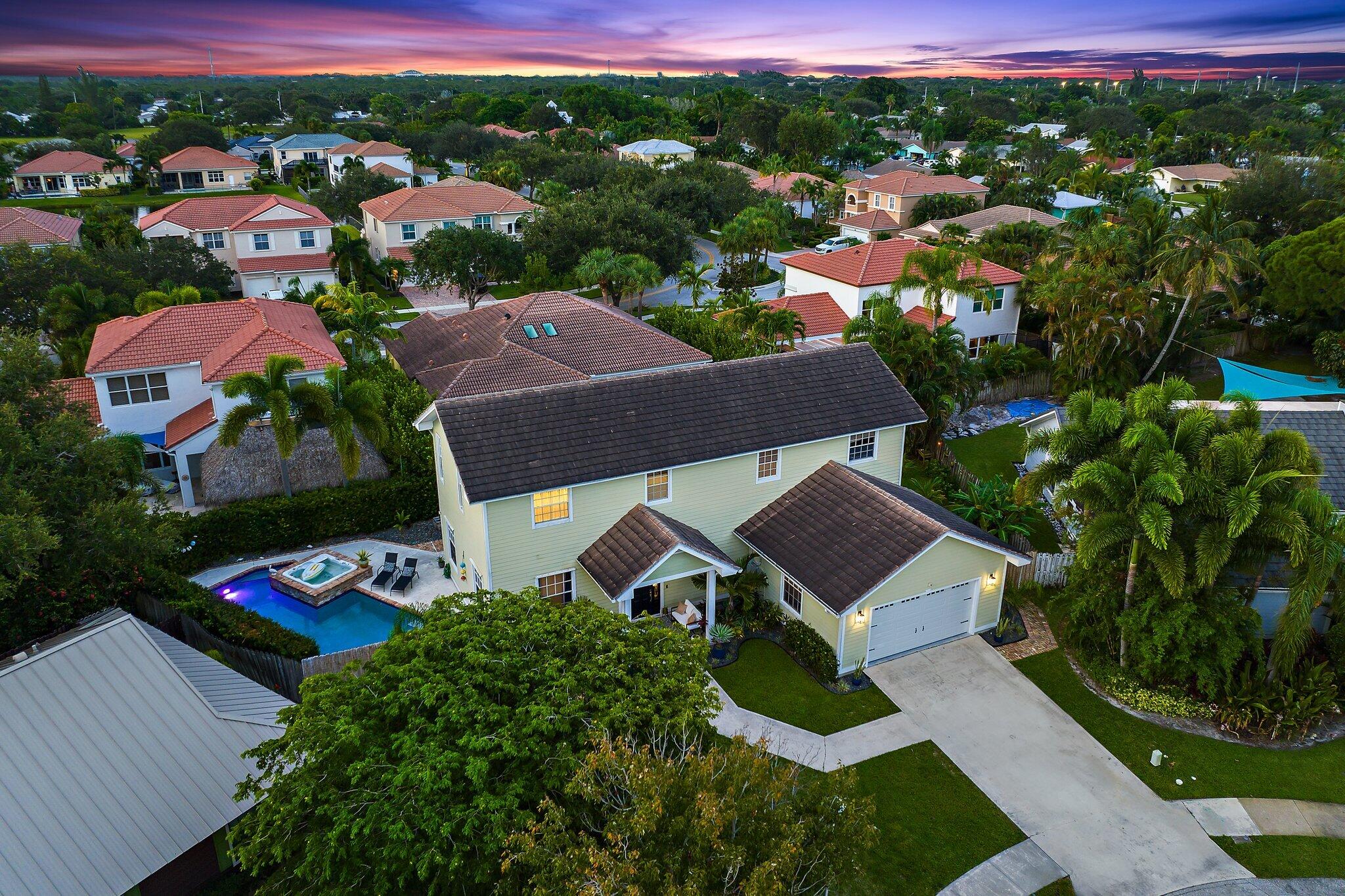 97 Beechwood Trail Tequesta, FL 33469 - Photo 12 of 113 an aerial view of a house with a garden