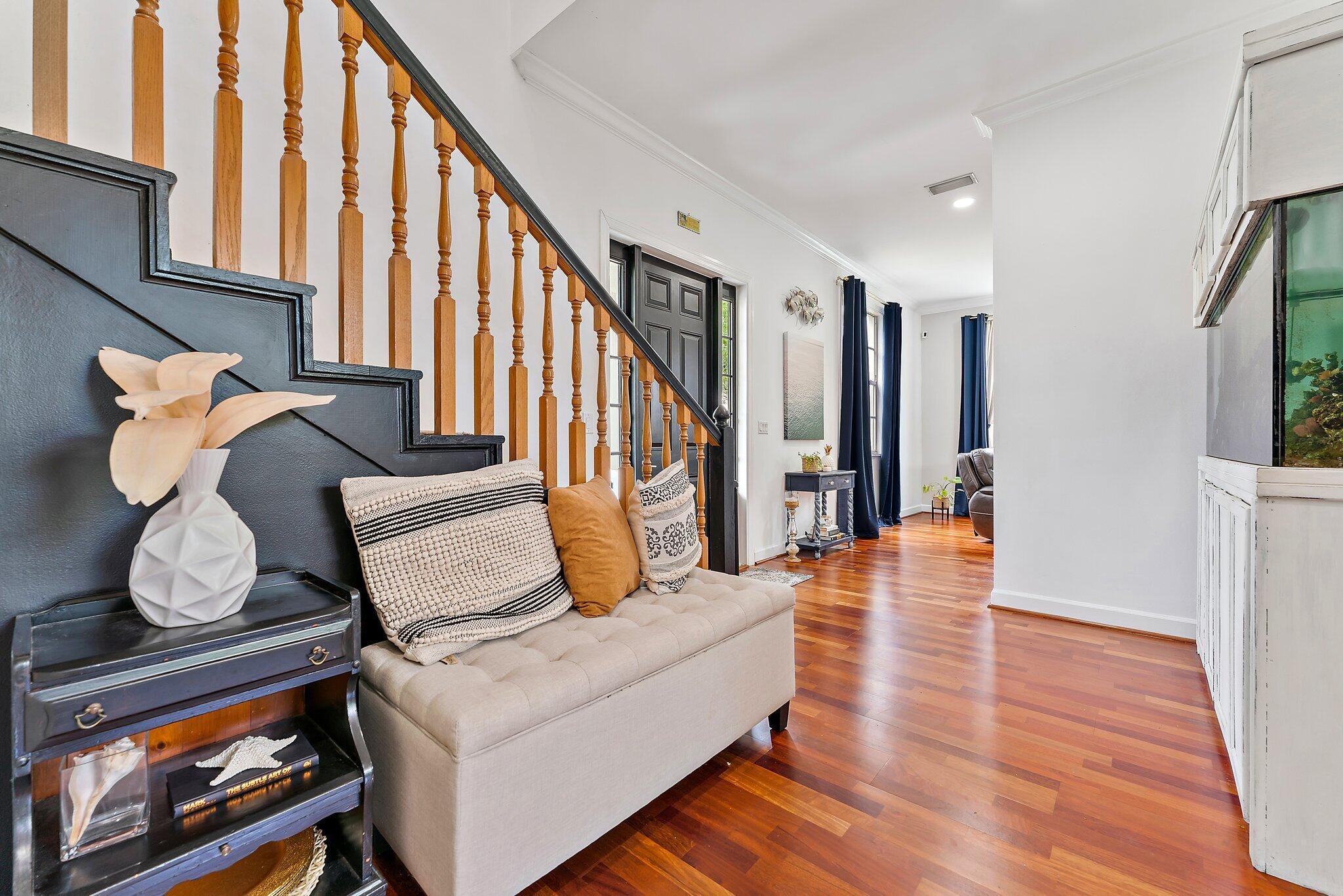 97 Beechwood Trail Tequesta, FL 33469 - Photo 59 of 113 a living room with furniture window and wooden floor
