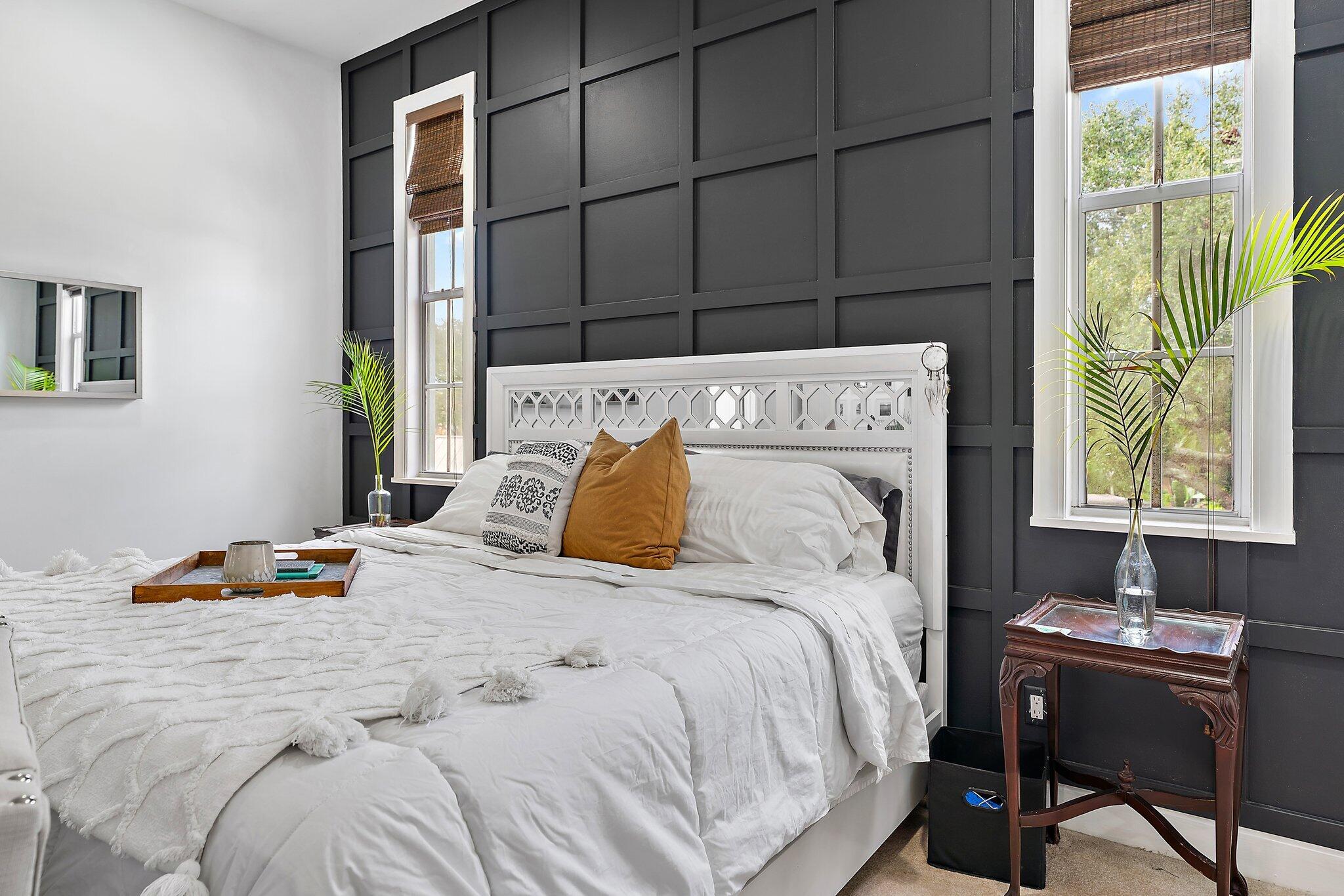 97 Beechwood Trail Tequesta, FL 33469 - Photo 87 of 113 a bedroom with a bed and a window