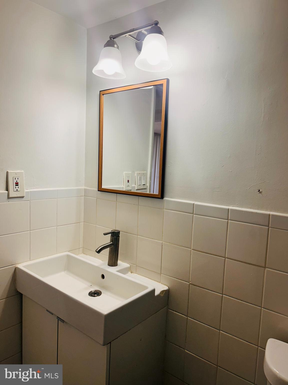 1828 Metzerott Road, Unit 405 Hyattsville, MD 20783 - Photo 13 of 15 Bathroom