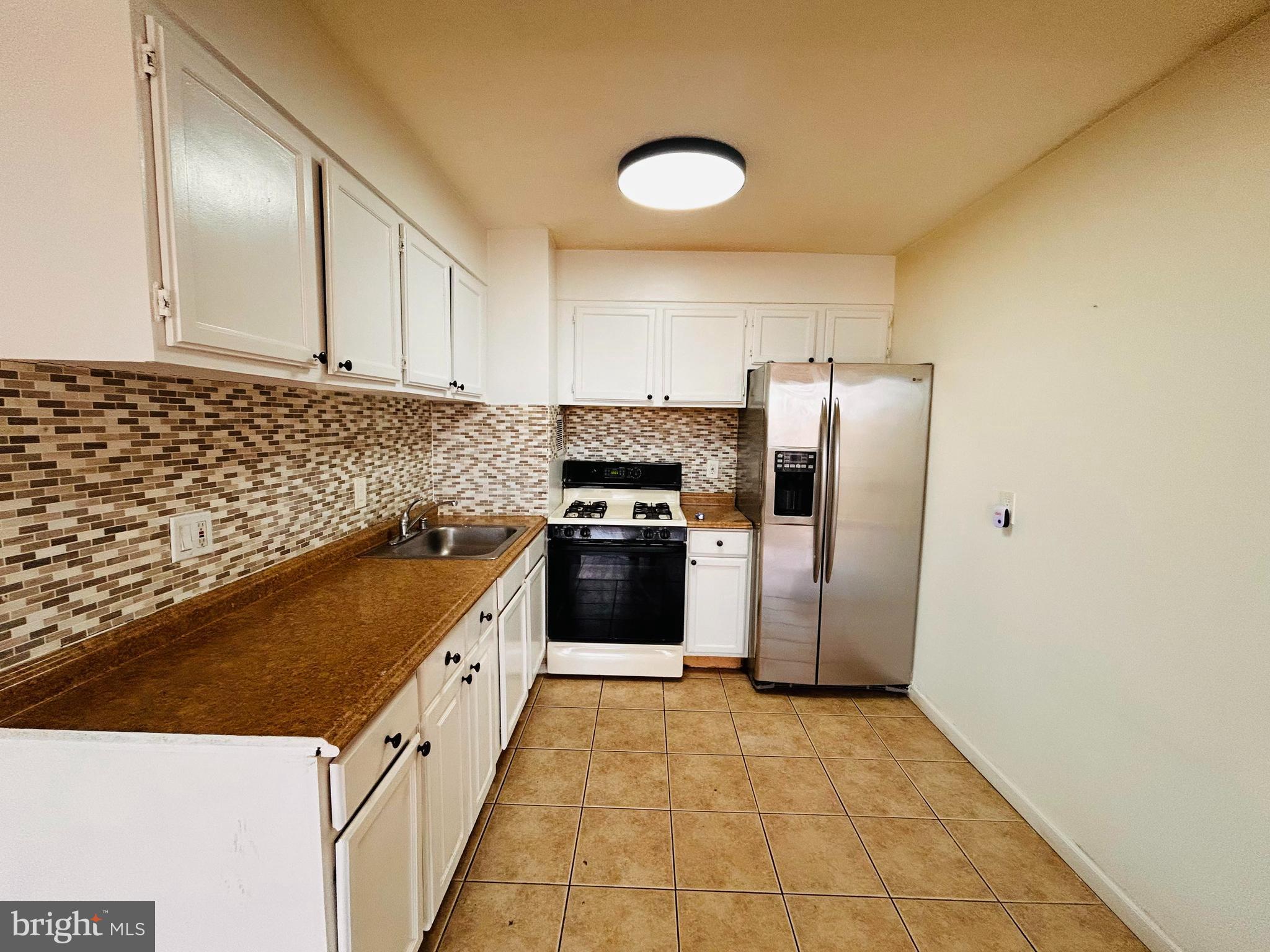 1828 Metzerott Road, Unit 405 Hyattsville, MD 20783 - Photo 6 of 15 Kitchen